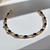 Yellow gold sapphire and diamond bracelet 14kt three-quarter angle