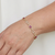 Red ruby and diamond bracelet 14kt yellow gold lifestyle shot