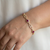 Ruby tennis bracelet 14kt yellow gold clasp detail