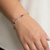 Natural oval ruby and diamond bracelet 14kt yellow gold close-up