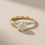 0.93tcw round-cut diamond engagement ring in solitaire setting in yellow gold — on-hand modeled view