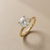 0.93tcw round-cut diamond engagement ring in solitaire setting in yellow gold — front view