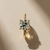0.93tcw round-cut diamond engagement ring in solitaire setting in yellow gold — side profile