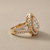 2.04tcw teardrop-cut diamond engagement ring in cluster setting in yellow gold — close-up detail