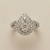 1.33tcw teardrop-cut diamond engagement ring in cluster setting in white gold — front view