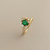 Treasured and Co. petite oval emerald ring 18kt yellow gold close-up