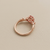 Padparadscha sapphire and diamond engagement ring rose gold front angle 3.10tcw