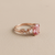 Pink orange padparadscha sapphire engagement ring diamond reflection rose gold