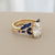 Oval lab diamond sapphire engagement ring set flat side view 14kt yellow gold