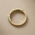 Emerald and diamond band ring 14kt yellow gold band setting detail