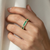 4mm emerald and diamond band 14kt yellow gold top-down view