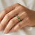 Bezel set emerald ring 14kt yellow gold top-down view