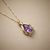 Pear-cut amethyst pendant 14kt yellow gold side profile