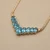 Oval Blue Topaz & Diamond Chevron Necklace