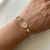 Religious bracelet with cubic zirconia accents 14kt yellow gold detail