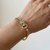 Miami Cuban link bracelet with panther motif 14kt yellow gold close-up