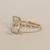 Radiant cut lab-grown diamond engagement ring 14kt yellow gold side view of split-shank