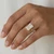 Yellow gold radiant cut lab-grown diamond engagement ring on hand model