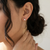 Pear shape 14kt yellow gold dangle earrings profile