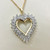 Treasured & Co. Round Cut Diamond Heart Necklace in 14kt Yellow Gold.
