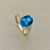 Elegant 2.15tcw Oval London Blue Topaz Diamond Ring in 14kt Yellow Gold.