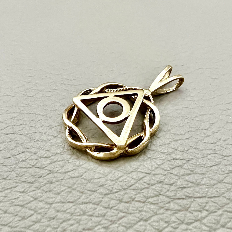 Spiritual gold pendant crafted in 14kt yellow gold, designed as a unique and meaningful accessory Treasured & Co.
