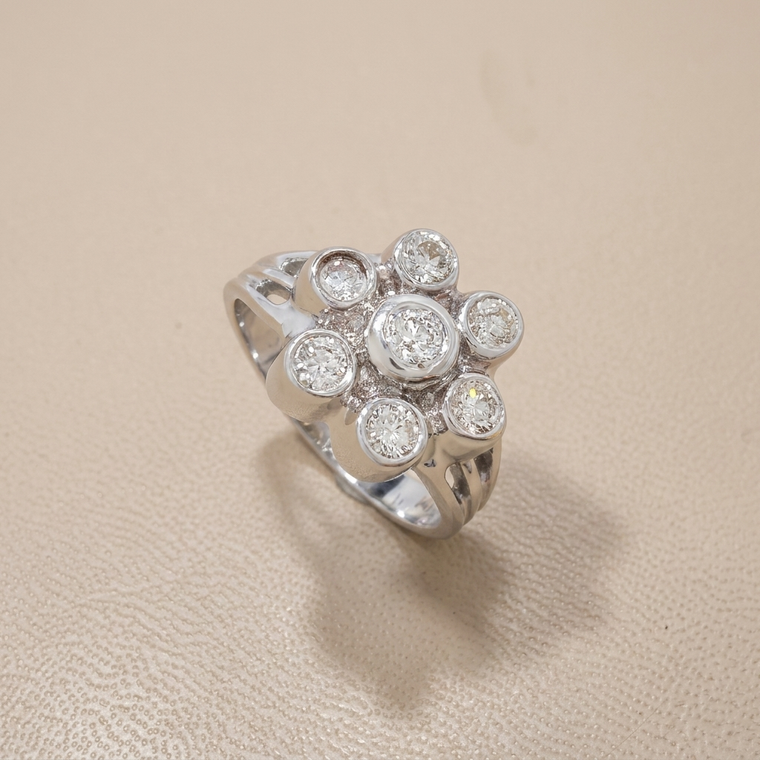 Bezel flower diamond ring, 0.62tcw natural diamonds in 14kt white gold floral cluster, angle view
