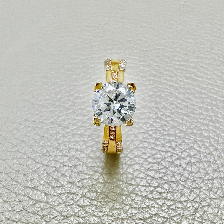 Timeless solitaire ring 2.00tcw, crafted in 14kt yellow gold. A unique and affordable engagement ring, perfect as a promise ring by Treasured & Co.