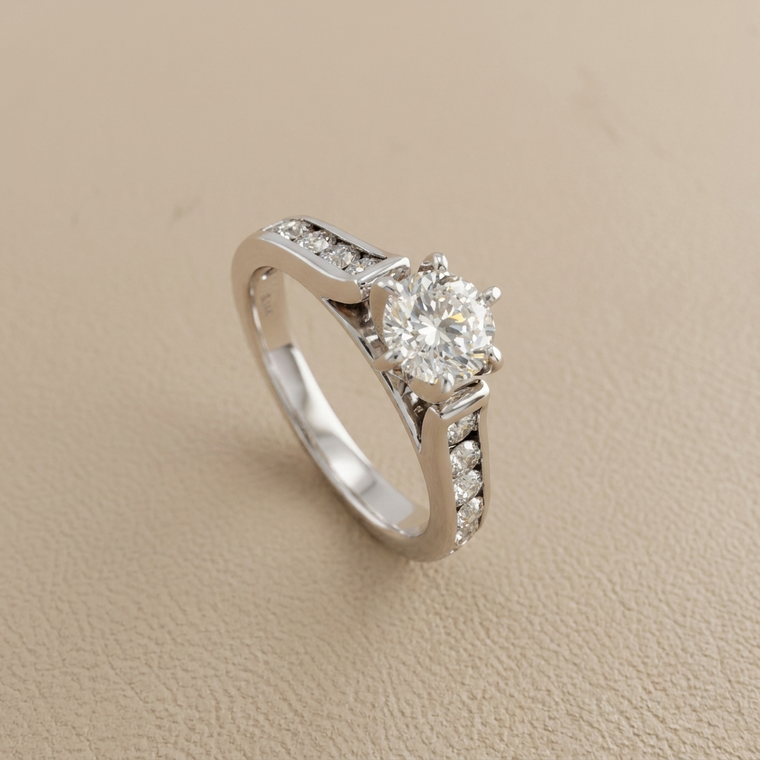 1.00tcw round-cut diamond engagement ring in channel-set setting — three-quarter angle