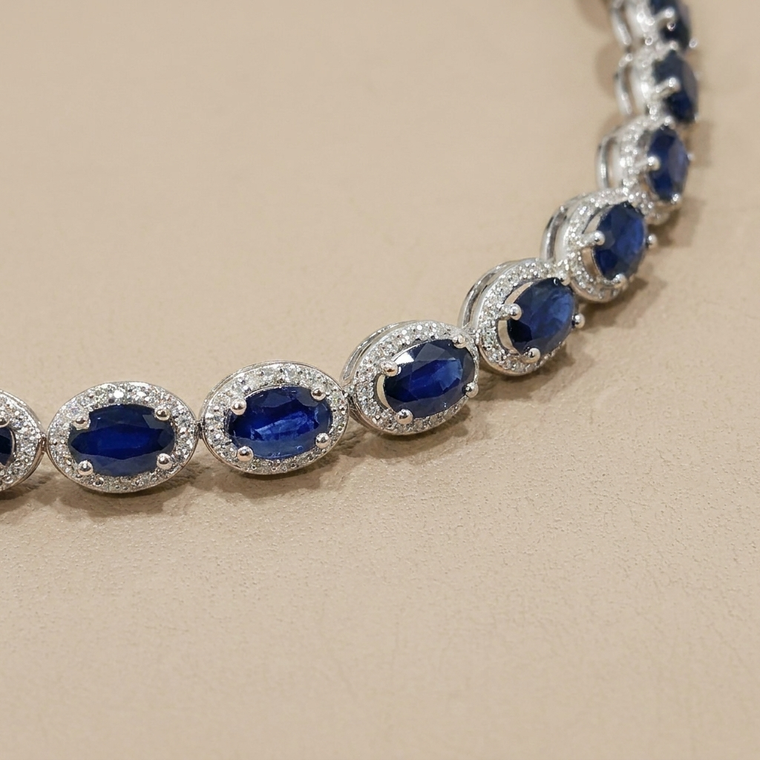 Sapphire and diamond halo tennis bracelet 13.40tcw 14kt white gold front view