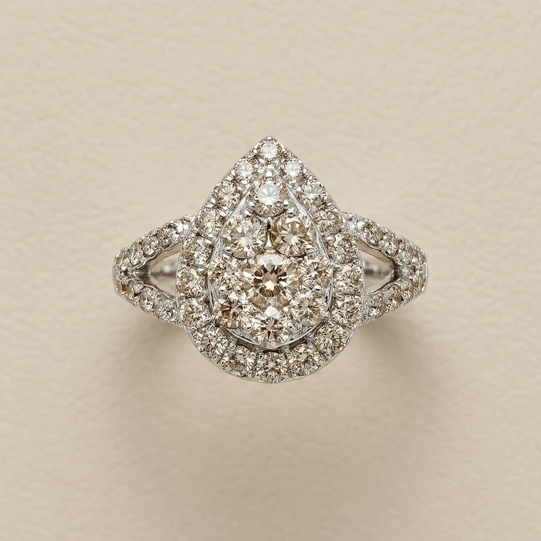 1.33tcw teardrop-cut diamond engagement ring in cluster setting in white gold — front view