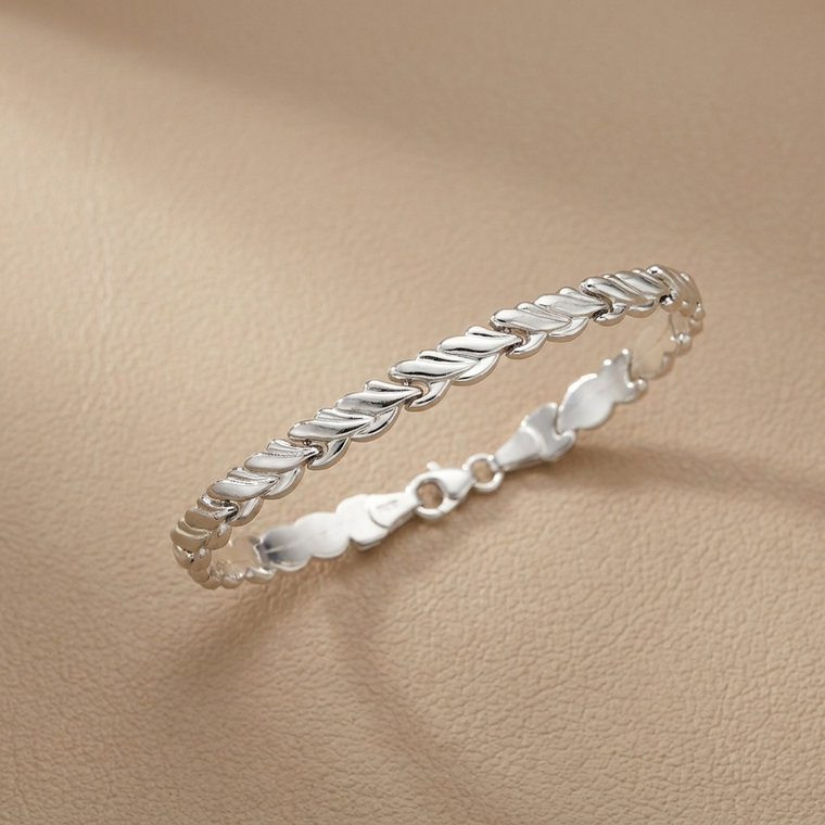 Floral-inspired white gold bracelet 14kt white gold front view
