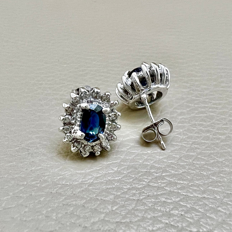 Elegant Oval Sapphire and Diamond Stud Earrings in 14kt White Gold Setting.