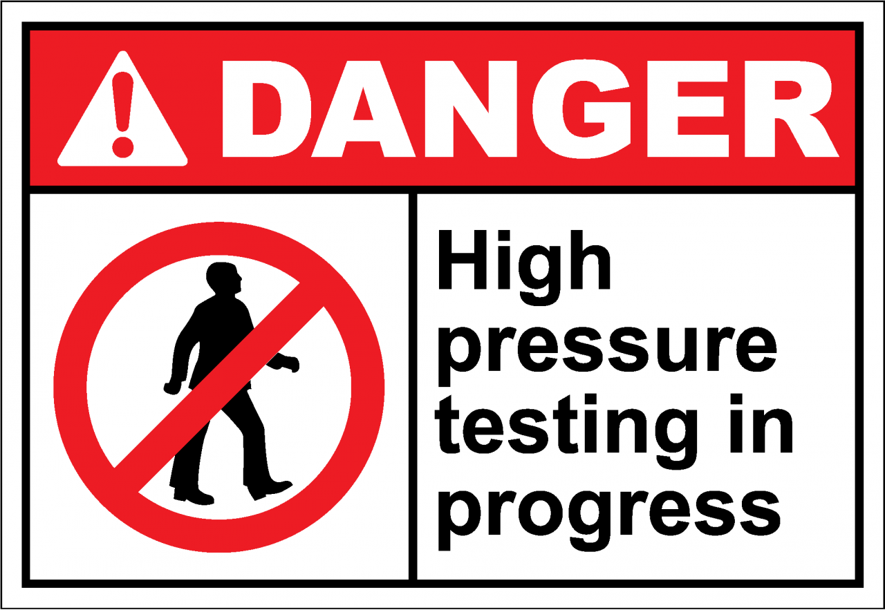 Danger Sign high pressure testing in progress