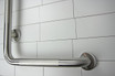 Frost 1003-SP30X30 Stainless Steel 30"x30" Grab Bar with a 1.25-inch diameter, offering secure and stylish support suitable for enhancing safety in any modern bathroom design.