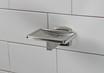 A close-up view of the Frost 1136-S Stainless Steel Soap Dish, showcasing its sturdy construction and elegant design, perfect for adding a touch of refinement to your washroom amenities.