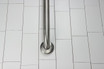 Frost 1001-SP12 Stainless Steel 12-inch Grab Bar with a 1.25-inch diameter, offering durable and stylish support in a compact design for enhanced bathroom safety.