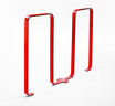The Frost 2080-Red outdoor steel bike rack in a vivid red, offering a secure, visible, and stylish parking solution for multiple bicycles.