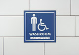 Frost 962 male and handicapped washroom signage in vibrant blue with white symbols and Braille, providing clear direction and accessibility for restrooms.