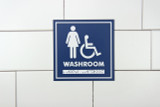 Frost 963 female and handicapped washroom signage in blue with white icons and Braille, for clear, accessible directions in facilities.