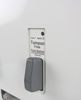 Frost 618-1-FREE white tampon and napkin vendor with a push-button interface, providing complimentary feminine hygiene products in a sleek design.