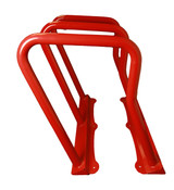 The durable and secure Frost 2090-Red steel bike rack, capable of accommodating six bicycles, stands out in a bold red, perfect for enhancing outdoor communal areas.