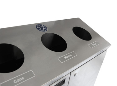 A Frost 316-S Free Standing Recycling Station in lustrous stainless steel, featuring designated slots for cans, plastics, and glass, perfect for maintaining a clean and organized recycling area in corporate or public spaces.