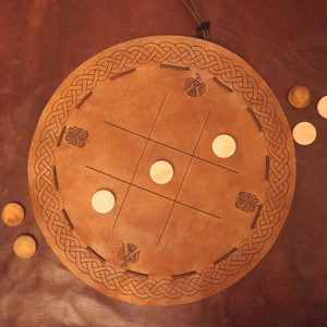 Viking Leather Tic Tac Toe Game – Handcrafted Multiplayer Board with Real Bone Pieces – Norse Travel Game for Adults & Gifting Viking Leather Tic Tac Toe Game – Handcrafted Multiplayer Board with Real Bone Pieces – Norse Travel Game for Adults & Gifting