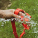 Zee.Dog Neopro Red H-Harness being washed outdoors