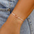 Bow Charm Rose Gold Vanilla Bracelet