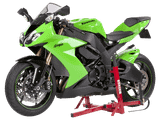 Once the Jack Stand is secured to the swing arm pivot using the bike-specific adapter, the bike can be balanced straight up and levered into the air with the telescopic extension built into the stand