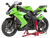 Once the Jack Stand is secured to the swing arm pivot using the bike-specific adapter, the bike can be balanced straight up and levered into the air with the telescopic extension built into the stand
