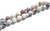 Close-up of natural amazonite prayer beads with unique stone patterns