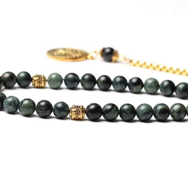 Close-Up of Natural Stone Tasbih Prayer Beads in Green Olive